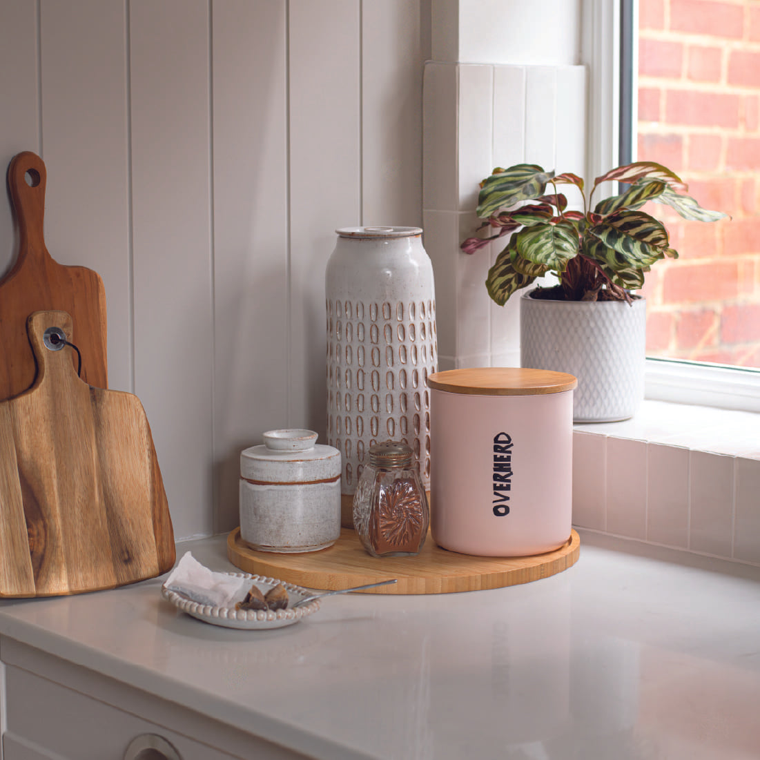 Overherd travel tin in kitchen setting