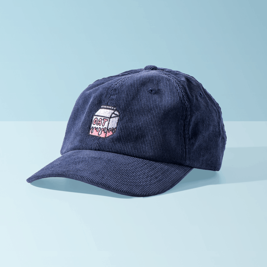 Overherd oat milk emblem cap on blue background