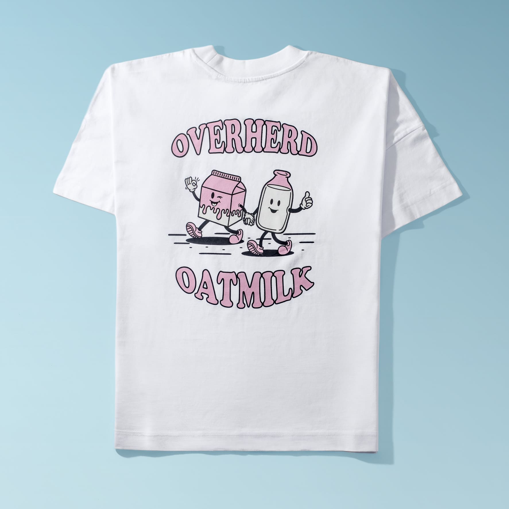 Overherd oat milk white t shirt on blue background