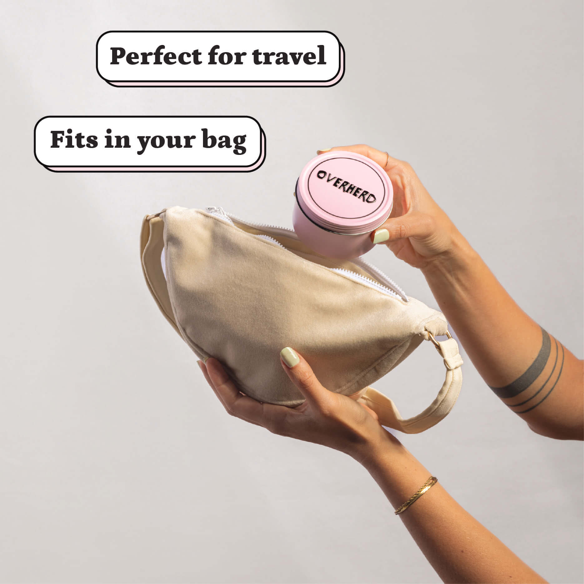 Pulling travel tin out of bag with feature annotations